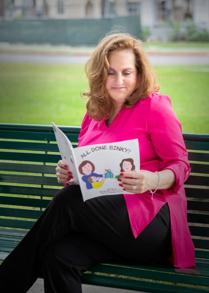 Michelle with her published book "All done Binky"